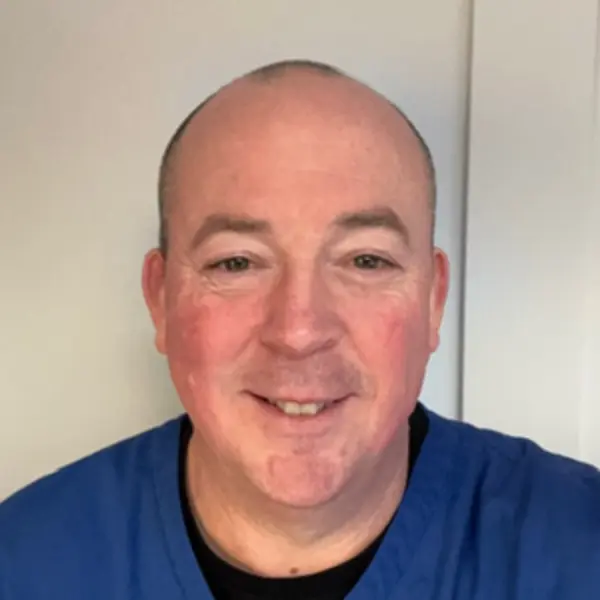 Dr Simon Theakston